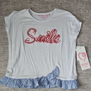 Design History White Tee with Red 'Smile' and Blue Ruffle